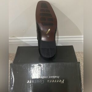 men’s dress shoes by the brand Ferrera Couture